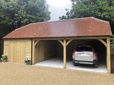 18. 6.0m x 5.4m 2 bay Carriage House with 3.6m x 5.4m attached Garage and tiled roof